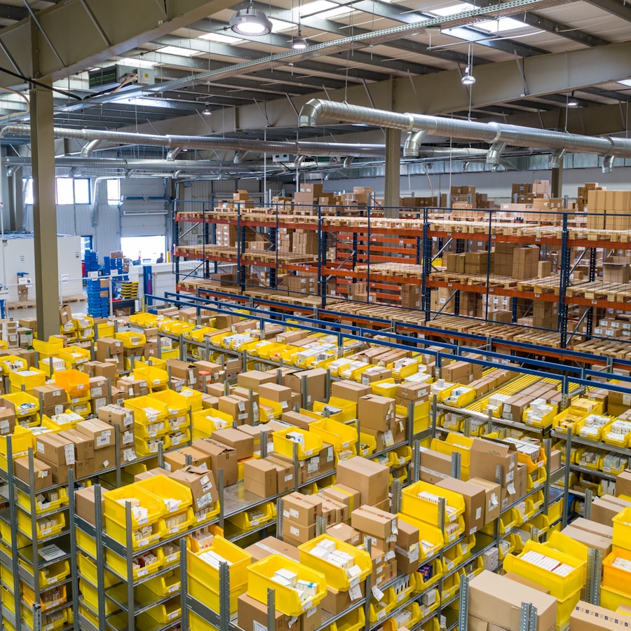 Yellow parts bins and packed boxes in the fulfillment warehouse